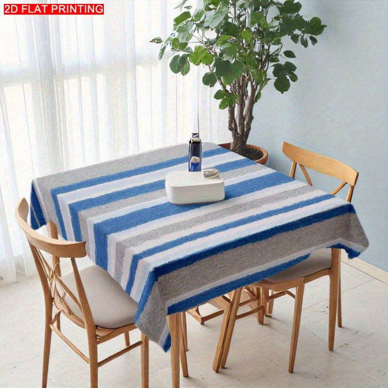 A Blue-Gray And White Striped Tablecloth, Perfect for Dining Tables, Coffee Tables, And Desks. It Serves As a Decorative Piece for Parties And Home Decor, Is Soft And Delicate, Machine Washable for Easy Cleaning, Enhances The Dining Atmosphere