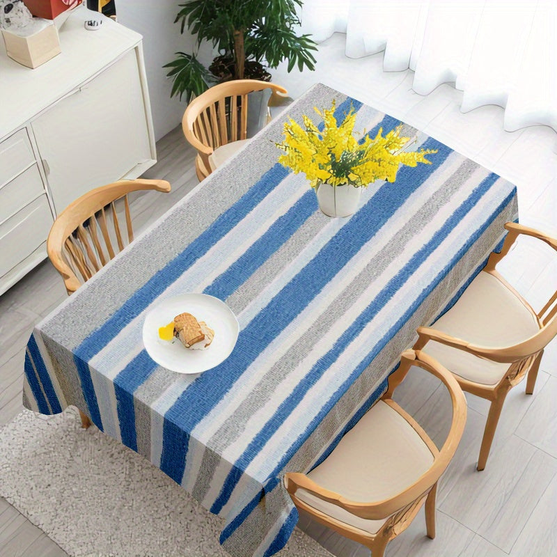 A Blue-Gray And White Striped Tablecloth, Perfect for Dining Tables, Coffee Tables, And Desks. It Serves As a Decorative Piece for Parties And Home Decor, Is Soft And Delicate, Machine Washable for Easy Cleaning, Enhances The Dining Atmosphere