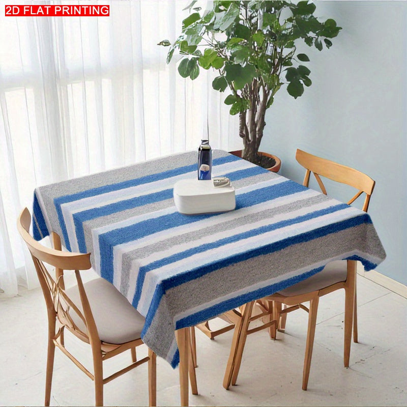 A Blue-Gray And White Striped Tablecloth, Perfect for Dining Tables, Coffee Tables, And Desks. It Serves As a Decorative Piece for Parties And Home Decor, Is Soft And Delicate, Machine Washable for Easy Cleaning, Enhances The Dining Atmosphere