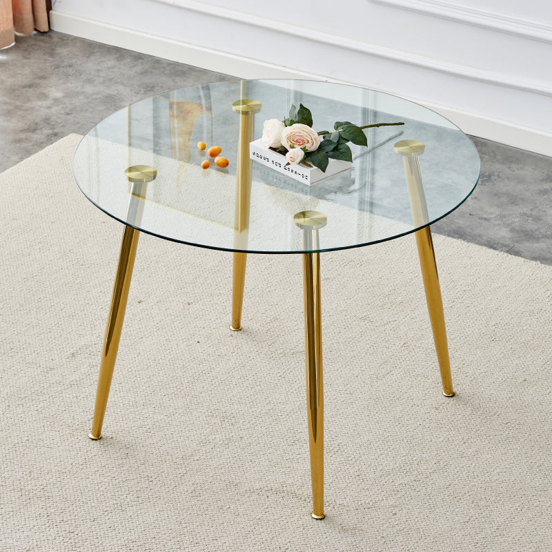 A Contemporary Round Glass Dining Table Measuring 40 Inches Across, Featuring Electroplated Golden Metal Legs, Perfect for Modern Living Spaces And Professional Meeting Rooms, Combining Stylish Functionality with a Streamlined Design for Larger Area